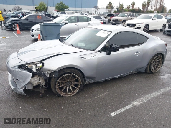 2016 Scion FR-S with VIN JF1ZNAA1XG8709798, listed as a IAAI auction lot 41713314 with 139,450 mi miles. Bid and sale history available at carsss.com. Image 2.