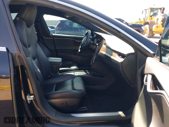 2021 Tesla Model S Long Range Plus with VIN 5YJSA1E28MF426080, listed as a IAAI auction lot 41979326 with 125,328 mi miles and . Bid and sale history available at DreamBid. Image 5.