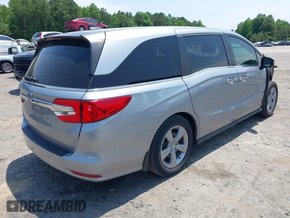2019 Honda Odyssey EX-L z VIN 5FNRL6H72KB083499, wystawiony jako IAAI lot #42297110 z przebiegiem 81 747 mil mil oraz . Historia ofert i sprzedaży dostępna na DreamBid. Obrazek 4.