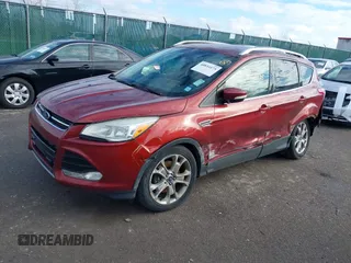 2015 Ford Escape Titanium with VIN 1FMCU9J91FUA26624, listed as a IAAI auction lot 40854175 with 132,313 mi miles. Bid and sale history available at carsss.com. Image 17.