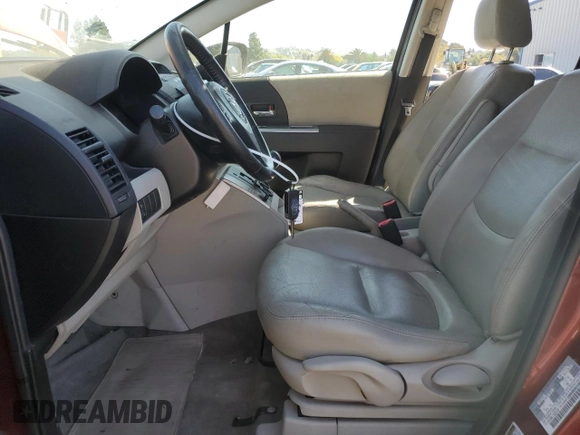 2010 Mazda 5 Sport with VIN JM1CR2WL1A0381830, listed as a Copart auction lot 75285824 with 143,455 mi miles and Salvage Title. Bid and sale history available at DreamBid. Image 7.