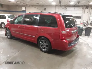 2008 Dodge Grand Caravan SXT with VIN 2D8HN54P18R120109, listed as a IAAI auction lot 41444663 with 165,610 mi miles and . Bid and sale history available at DreamBid. Image 3.