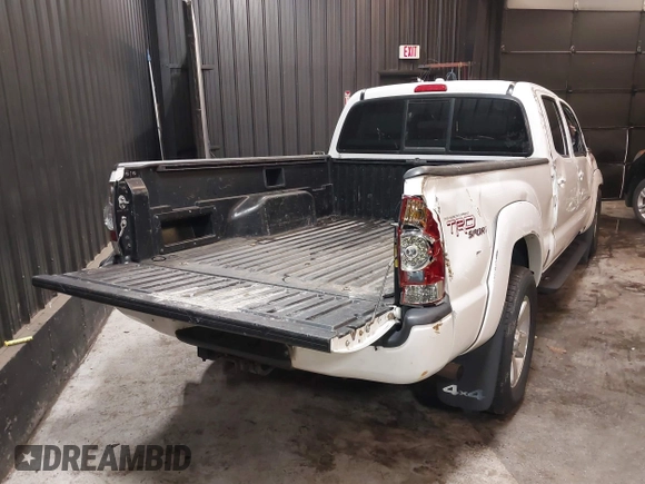 2010 Toyota Tacoma with VIN 5TEMU4FN1AZ738584, listed as a IAAI auction lot 42288815 with 184,679 mi miles and . Bid and sale history available at DreamBid. Image 4.
