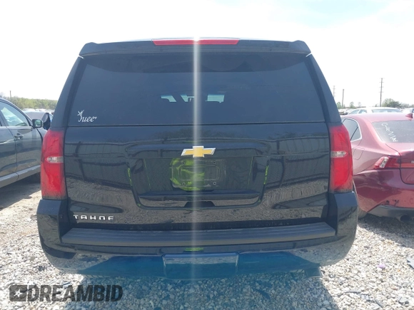 2018 Chevrolet Tahoe LT with VIN 1GNSKBKC7JR245565, listed as a IAAI auction lot 42097400 with 123,709 mi miles and . Bid and sale history available at DreamBid. Image 17.