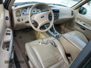 2001 Ford Explorer Sport z VIN 1FMCU70E11UC05855, wystawiony jako Copart lot #50819265 z przebiegiem 105 311 mil mil oraz Tytuł czysty. Historia ofert i sprzedaży dostępna na DreamBid. Obrazek 8.