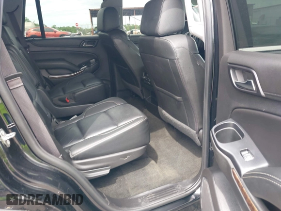 2017 Chevrolet Tahoe LT z VIN 1GNSKBKC8HR311969, wystawiony jako IAAI lot #42126414 z przebiegiem 160 994 mil mil oraz . Historia ofert i sprzedaży dostępna na DreamBid. Obrazek 8.