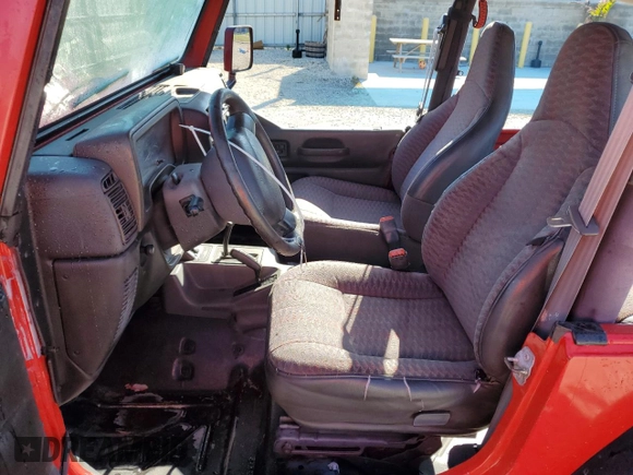 1999 Jeep Wrangler SE with VIN 1J4FY29P8XP483909, listed as a Copart auction lot 48679555 with 168,708 mi miles and Salvage title. Bid and sale history available at DreamBid. Image 7.