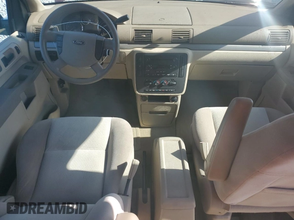 2006 Ford Freestar SE z VIN 2FMZA51636BA02932, wystawiony jako Copart lot #52506005 z przebiegiem 74 512 mil mil oraz Szkody całkowita. Historia ofert i sprzedaży dostępna na DreamBid. Obrazek 8.