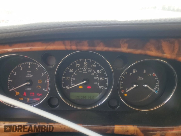 2007 Jaguar XJ Vanden Plas z VIN SAJWA82B67SH13461, wystawiony jako Copart lot #49654865 z przebiegiem 151 298 mil mil oraz Szkoda całkowita • Salvage title. Historia ofert i sprzedaży dostępna na DreamBid. Obrazek 9.