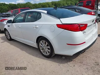 2015 Kia Optima EX with VIN 5XXGN4A77FG497218, listed as a IAAI auction lot 42464839 with 128,355 mi miles and . Bid and sale history available at DreamBid. Image 3.