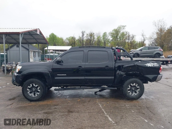2015 Toyota Tacoma with VIN 3TMLU4ENXFM185371, listed as a IAAI auction lot 41952513 with 87,128 mi miles and . Bid and sale history available at DreamBid. Image 14.