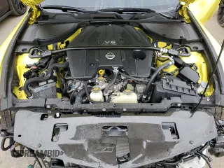 2023 Nissan Z Performance z VIN JN1BZ4BH1PM310365, wystawiony jako Copart lot #73693544 z przebiegiem 10 320 mil mil oraz Szkody całkowita. Historia ofert i sprzedaży dostępna na DreamBid. Obrazek 11.