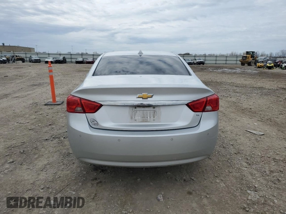 2014 Chevrolet Impala LT with VIN 1G1125S37EU102018, listed as a Copart auction lot 52813305 with 210,961 mi miles and Non Repairable. Bid and sale history available at DreamBid. Image 6.