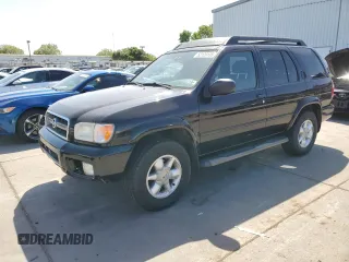 2002 Nissan Pathfinder SE z VIN JN8DR09Y72W725776, wystawiony jako Copart lot #52129135 z przebiegiem 138 310 mil mil oraz Czysty tytuł • Clean title. Historia ofert i sprzedaży dostępna na DreamBid. Obrazek 1.