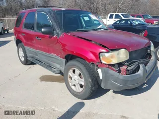 2003 Ford Escape XLT Popular with VIN 1FMYU03143KB33988, listed as a IAAI auction lot 41524123 with 1 mi miles. Bid and sale history available at carsss.com. Image 1.