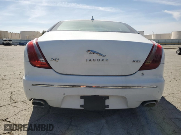 2013 Jaguar XJ with VIN SAJWA1C79D8V51400, listed as a Copart auction lot 54972475 with 79,471 mi miles and Clean Title. Bid and sale history available at DreamBid. Image 6.
