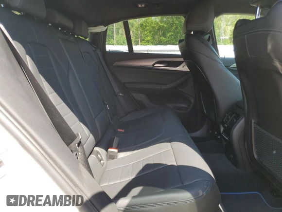 2019 BMW X4 M40i z VIN 5UXUJ5C57KLJ63215, wystawiony jako Copart lot #55150835 z przebiegiem Nie podano mil oraz Szkody całkowita. Historia ofert i sprzedaży dostępna na DreamBid. Obrazek 11.
