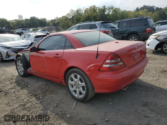 2002 Mercedes-Benz SLK-Class 2.3L Kompressor with VIN WDBKK49F22F249805, listed as a Copart auction lot 71058304 with 57,850 mi miles and Salvage Title. Bid and sale history available at carsss.com. Image 2.