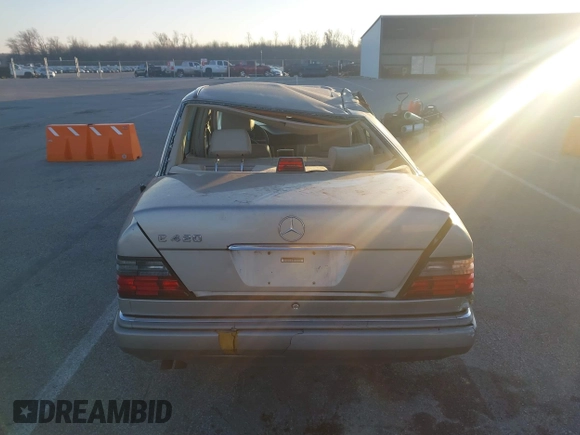 1994 Mercedes-Benz 400 with VIN WDBEA34E4RC015119, listed as a IAAI auction lot 40933590 with 77,554 mi miles. Bid and sale history available at carsss.com. Image 13.