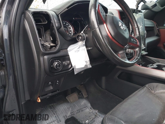 2019 Ram 1500 Rebel z VIN 1C6SRFLT2KN900600, wystawiony jako IAAI lot #41307832 z przebiegiem 74 481 mil mil oraz . Historia ofert i sprzedaży dostępna na DreamBid. Obrazek 19.
