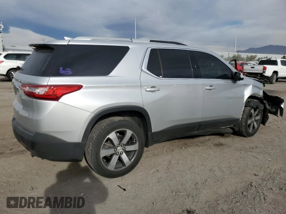 2018 Chevrolet Traverse LT z VIN 1GNEVHKW6JJ101635, wystawiony jako Copart lot #50765775 z przebiegiem 84 280 mil mil oraz Szkoda całkowita • Salvage title. Historia ofert i sprzedaży dostępna na DreamBid. Obrazek 3.