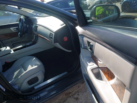 2015 Jaguar XF T Premium with VIN SAJWA0FS0FPU43248, listed as a IAAI auction lot 41977730 with 105,086 mi miles and . Bid and sale history available at DreamBid. Image 5.