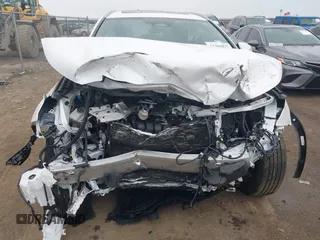 2024 Lexus NX 250 Premium with VIN 2T2GDCAZXRC015315, listed as a IAAI auction lot 41360875 with 7,294 mi miles and . Bid and sale history available at DreamBid. Image 6.