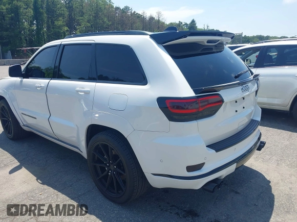2019 Jeep Grand Cherokee Summit with VIN 1C4RJFJT1KC785744, listed as a IAAI auction lot 42645006 with 38,483 mi miles and . Bid and sale history available at DreamBid. Image 3.