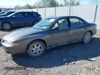 2001 Oldsmobile Intrigue GX z VIN 1G3WH52H11F148269, wystawiony jako IAAI lot #42238449 z przebiegiem Nie podano mil oraz . Historia ofert i sprzedaży dostępna na DreamBid. Obrazek 2.