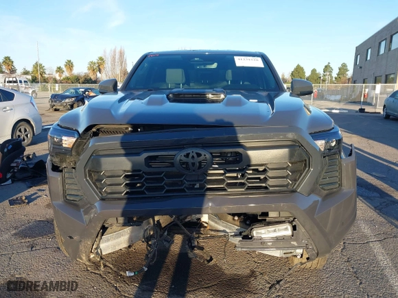 2024 Toyota Tacoma 4WD SR5 with VIN 3TMLB5JN3RM046513, listed as a IAAI auction lot 41231528 with 7,091 mi miles. Bid and sale history available at carsss.com. Image 12.