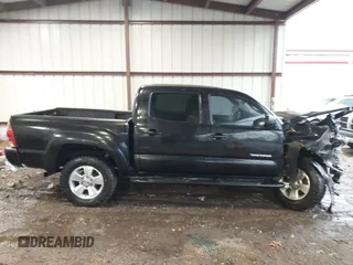 2006 Toyota Tacoma PreRunner z VIN 3TMJU62NX6M022436, wystawiony jako IAAI lot #41566792 z przebiegiem 273 922 mil mil oraz . Historia ofert i sprzedaży dostępna na DreamBid. Obrazek 13.
