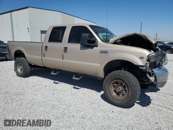 1999 Ford F-350 XL with VIN 1FTSW31S0XEC29624, listed as a Copart auction lot 70879344 with 151,680 mi miles and Salvage title. Bid and sale history available at DreamBid. Image 4.