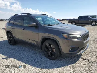 2019 Jeep Cherokee Latitude Plus with VIN 1C4PJLLB9KD338776, listed as a Copart auction lot 50839025 with 70,221 mi miles and Salvage title. Bid and sale history available at DreamBid. Image 4.