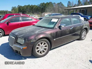 2005 Chrysler 300 with VIN 2C3AA63H75H577363, listed as a IAAI auction lot 41892999 with 229,634 mi miles. Bid and sale history available at carsss.com. Image 2.