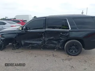 2018 Chevrolet Tahoe Commercial z VIN 1GNLCDEC6JR204921, wystawiony jako IAAI lot #42039630 z przebiegiem 96 008 mil mil oraz . Historia ofert i sprzedaży dostępna na DreamBid. Obrazek 14.
