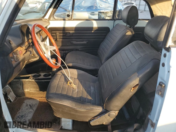 1979 Volkswagen Beetle with VIN 1592031742, listed as a Copart auction lot 77628044 with 93,929 mi miles and Salvage Title. Bid and sale history available at DreamBid. Image 7.