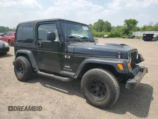 2005 Jeep Wrangler X z VIN 1J4FA39S75P321328, wystawiony jako Copart lot #59711505 z przebiegiem 126 768 mil mil oraz Szkoda całkowita • Salvage title. Historia ofert i sprzedaży dostępna na DreamBid. Obrazek 4.