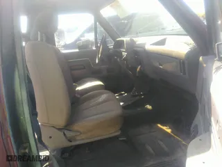 1990 Ford Bronco XL with VIN 1FMEU15N7LLA25223, listed as a IAAI auction lot 41858217 with 196,000 mi miles. Bid and sale history available at carsss.com. Image 5.
