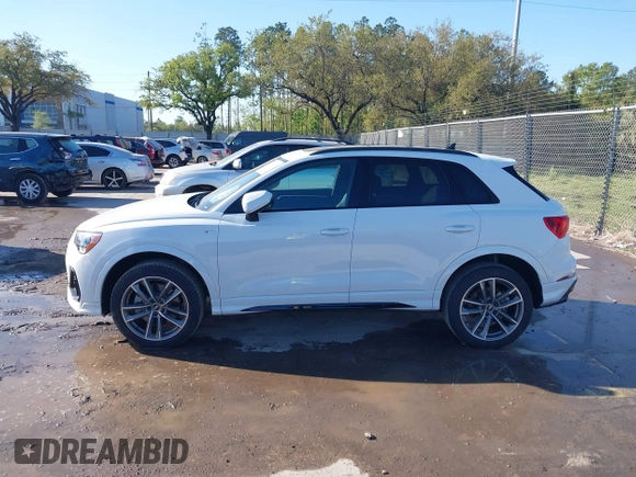 2022 Audi Q3 S line Premium z VIN WA1DECF37N1092225, wystawiony jako IAAI lot #41786815 z przebiegiem 41 973 mil mil oraz . Historia ofert i sprzedaży dostępna na DreamBid. Obrazek 14.