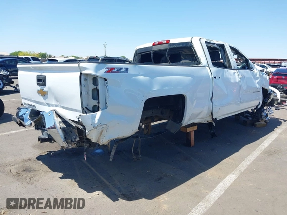 2015 Chevrolet Silverado 1500 LT with VIN 1GCUKREC5FF199331, listed as a IAAI auction lot 42111381 with 180,056 mi miles and . Bid and sale history available at DreamBid. Image 4.