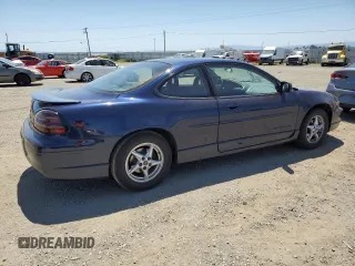 2000 Pontiac Grand Prix GT z VIN 1G2WP12K7YF189639, wystawiony jako Copart lot #57891595 z przebiegiem 70 055 mil mil oraz Tytuł czysty. Historia ofert i sprzedaży dostępna na DreamBid. Obrazek 3.