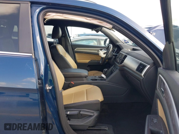 2021 Volkswagen Atlas SE z VIN 1V2WC2CA4MC232301, wystawiony jako IAAI lot #42538962 z przebiegiem Nie podano mil oraz . Historia ofert i sprzedaży dostępna na DreamBid. Obrazek 5.