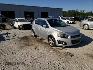 2012 Chevrolet Sonic LTZ z VIN 1G1JE6SH4C4101608, wystawiony jako Copart lot #53111725 z przebiegiem 203 012 mil mil oraz Szkoda całkowita • Salvage title. Historia ofert i sprzedaży dostępna na DreamBid. Obrazek 13.