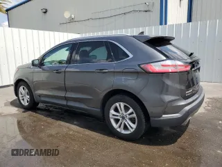 2020 Ford Edge SEL с VIN 2FMPK4J95LBB17293, выставлен на аукционе Copart как лот 58796255 с пробегом 82 583 миль миль и Чистый • Clean title. История ставок и продаж доступна на DreamBid. Изображение 2.