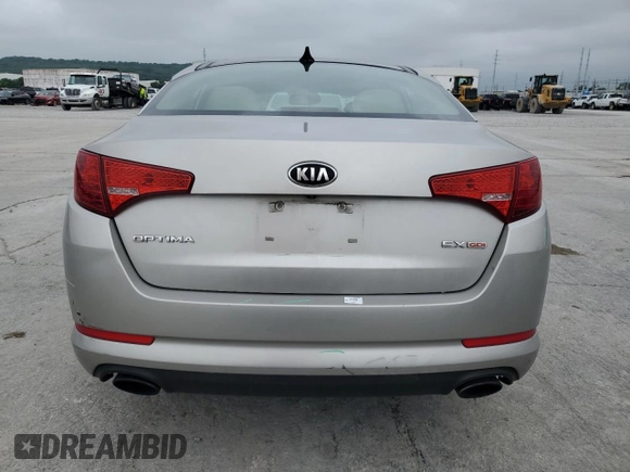 2013 Kia Optima EX z VIN 5XXGN4A76DG124488, wystawiony jako Copart lot #59487325 z przebiegiem 161 440 mil mil oraz Szkoda całkowita • Salvage title. Historia ofert i sprzedaży dostępna na DreamBid. Obrazek 6.
