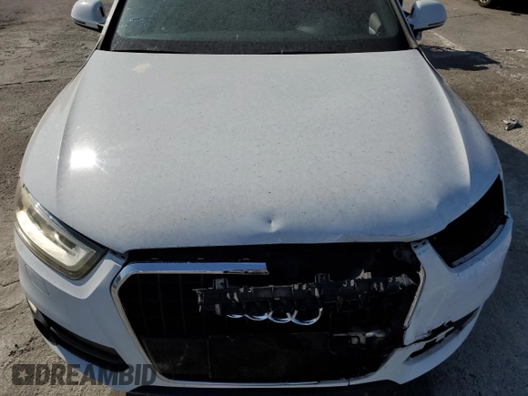 2015 Audi Q3 Prestige with VIN WA1FFCFS5FR008970, listed as a Copart auction lot 63481644 with 103,795 mi miles and Salvage title. Bid and sale history available at DreamBid. Image 14.