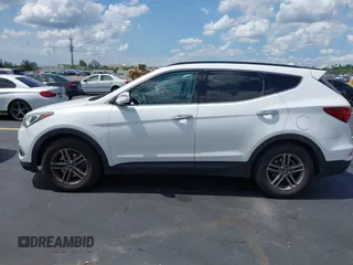 2017 Hyundai Santa Fe 2.4L z VIN 5NMZU3LB9HH034850, wystawiony jako IAAI lot #42342054 z przebiegiem 192 154 mil mil oraz . Historia ofert i sprzedaży dostępna na DreamBid. Obrazek 15.