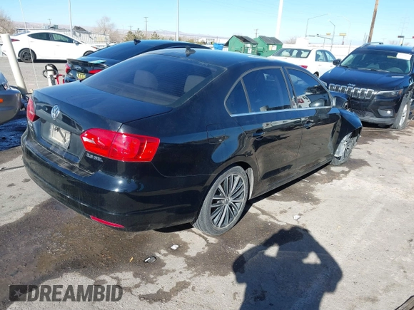 2012 Volkswagen Jetta Sedan SEL w/Sunroof with VIN 3VWLX7AJ1CM376990, listed as a IAAI auction lot 41206594 with 50,906 mi miles. Bid and sale history available at carsss.com. Image 4.