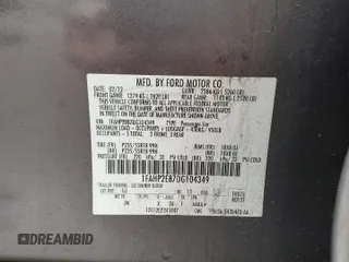 2013 Ford Taurus SEL z VIN 1FAHP2E87DG104349, wystawiony jako Copart lot #57143135 z przebiegiem 129 927 mil mil oraz Szkoda całkowita • Salvage title. Historia ofert i sprzedaży dostępna na DreamBid. Obrazek 12.