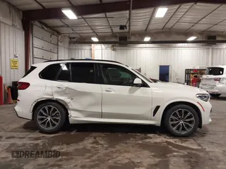 2020 BMW X5 xDrive40i with VIN 5UXCR6C01LLL66648, listed as a IAAI auction lot 42372631 with 59,770 mi miles and . Bid and sale history available at DreamBid. Image 13.